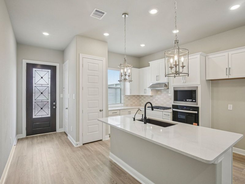 Furnished interior view inside a new home in Pinewood Trails - Luxe Series, Atascocita (Image 5).