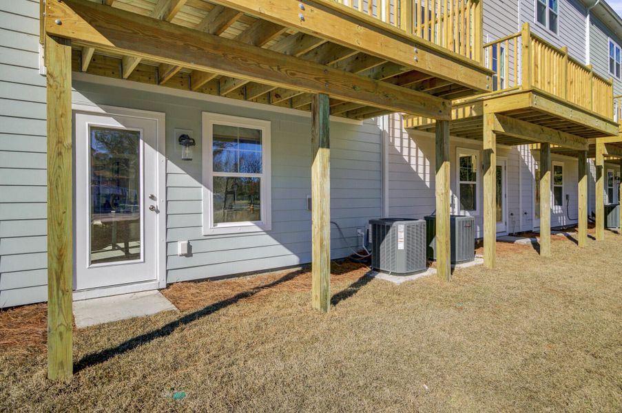 Exterior details and patio area of a home in , Johns Island (Image 25).