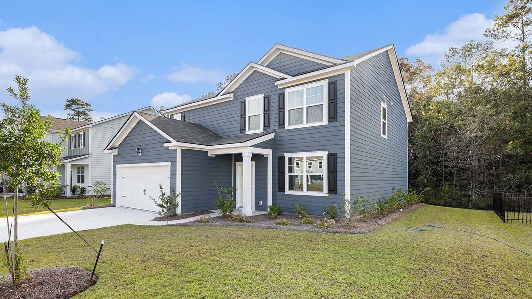 Representative exterior photo of a completed home built from the Plan by D.R. Horton in Hemingway Landing, Conway, SC (Image 2). Representative exterior photo of a completed home built from the Plan by D.R. Horton in Hemingway Landing, Conway, SC (Image 2).