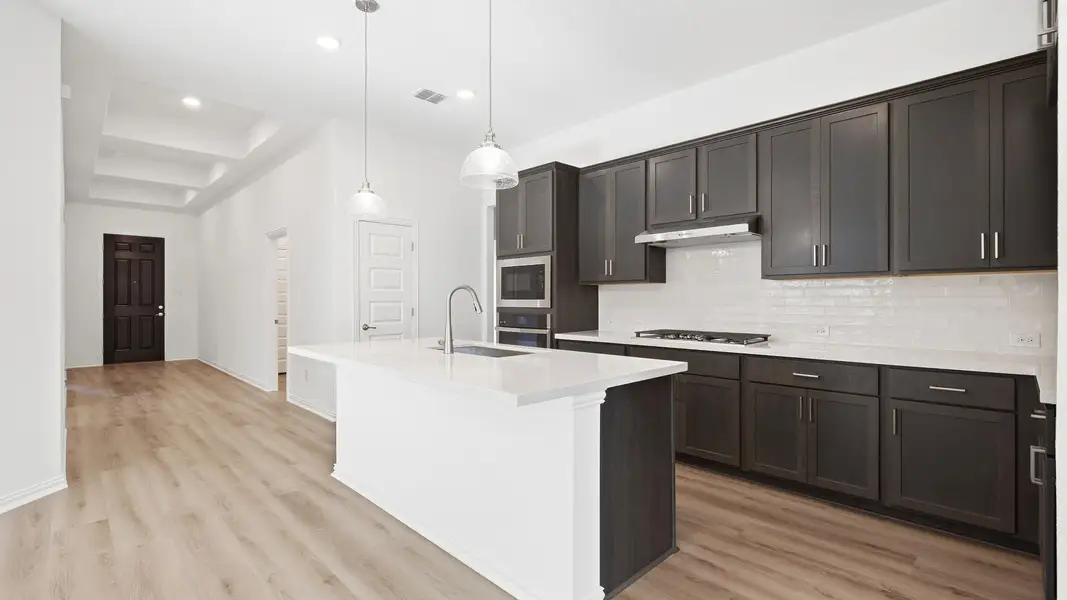 Furnished interior view inside a new home in Sunfield, Buda (Image 22).