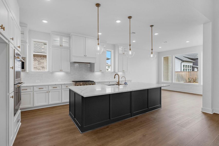 Furnished interior view inside a new home in Bridgeland, Cypress (Image 6).