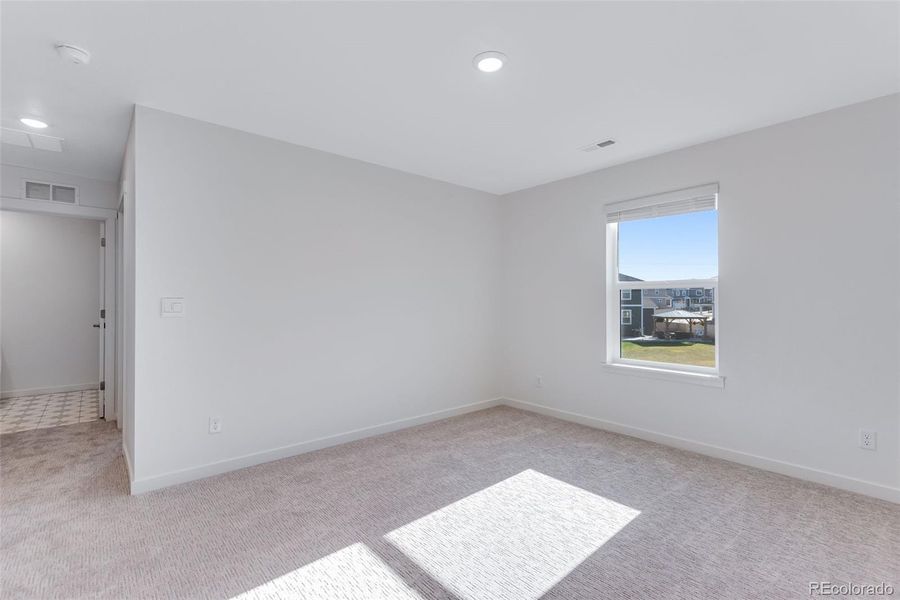 Spacious, unfurnished interior of a new home in Trails at Crowfoot, Parker (Image 32).