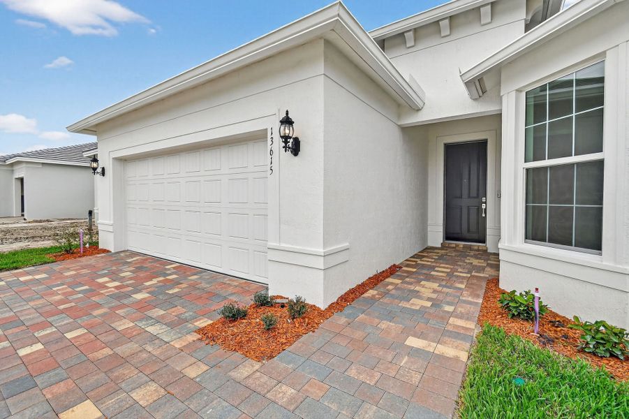 Exterior details and patio area of a home in Del Webb Tradition, Port St. Lucie (Image 31).
