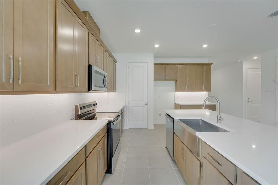 Furnished interior view inside a new home in Tuscan Hills, Dade City (Image 14).