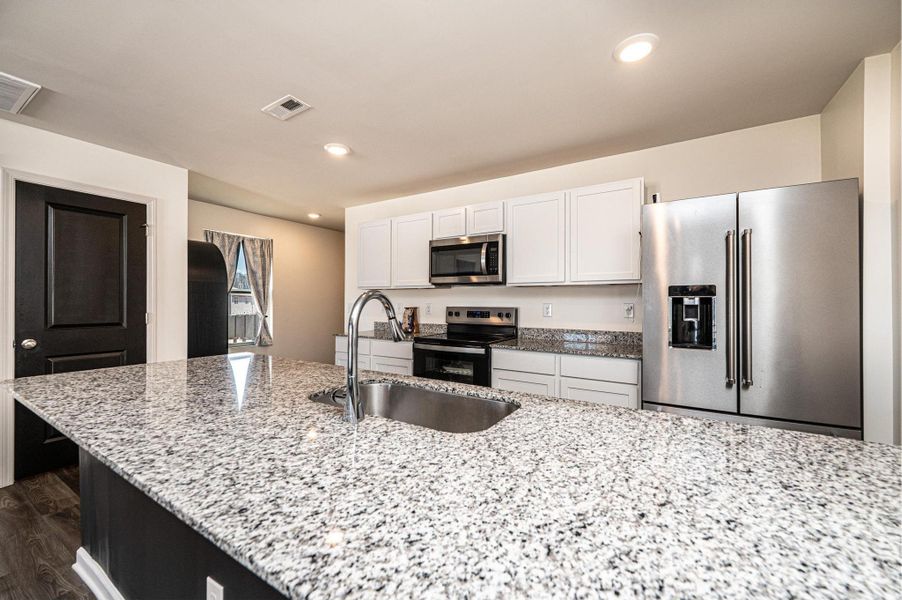 Furnished interior view inside a new home in , Newton (Image 10).