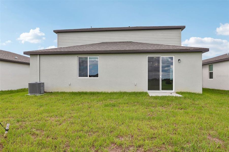 Exterior details and patio area of a home in Benton Hills - Classic Series, Brooksville (Image 4).