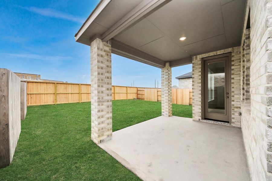 Exterior details and patio area of a home in Elyson, Katy (Image 18).
