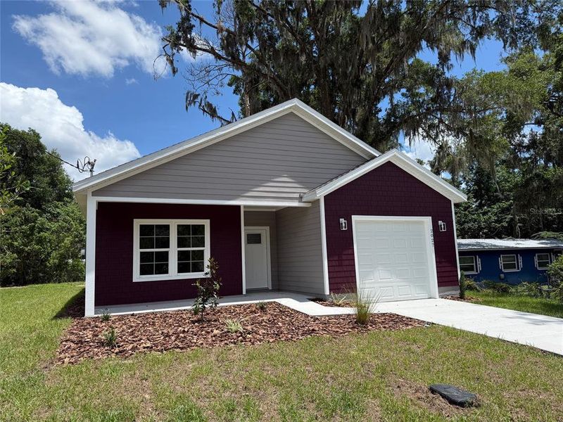 Front exterior of a new home in , Gainesville, FL, highlighting curb appeal (Image 2). Front exterior of a new home in , Gainesville, FL, highlighting curb appeal (Image 2).