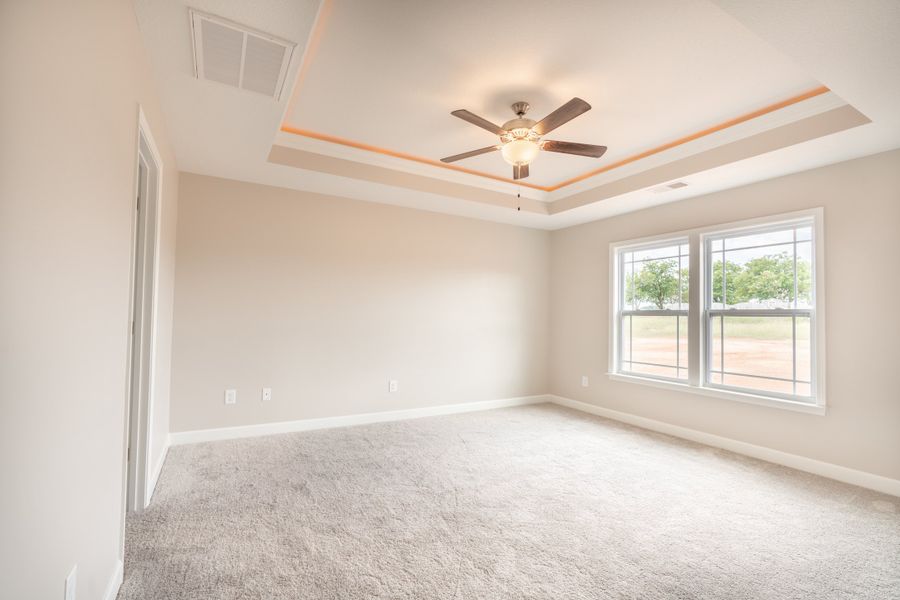 Representative unfurnished interior of a home built from the Sage by Enchanted Homes in Lonesome Dove, San Antonio (Image 23).