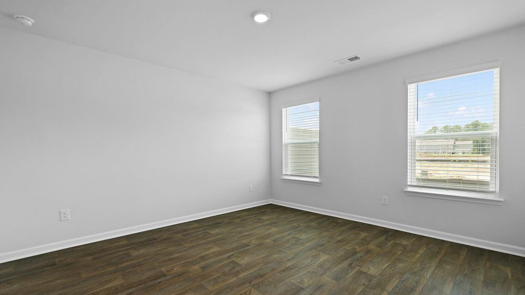 Spacious, unfurnished interior of a new home in Pine Hills Townhomes at Cane Bay, Summerville (Image 25). Spacious, unfurnished interior of a new home in Pine Hills Townhomes at Cane Bay, Summerville (Image 25).