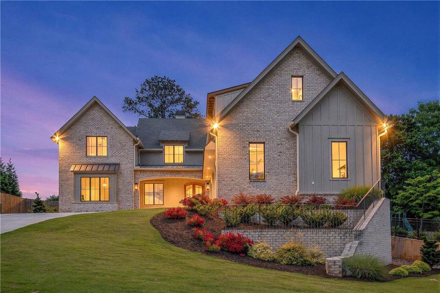 Front exterior of a new home in , Smyrna, GA, highlighting curb appeal (Image 31). Front exterior of a new home in , Smyrna, GA, highlighting curb appeal (Image 31).