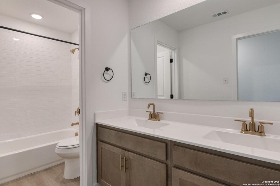 Furnished interior view inside a new home in The Arbors at the Wilder, Adkins (Image 11).