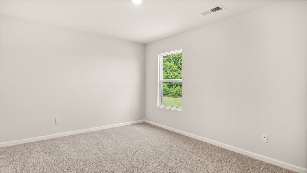 Representative unfurnished interior of a home built from the Elle by D.R. Horton in Preserve at Dove Creek, Statham (Image 29).