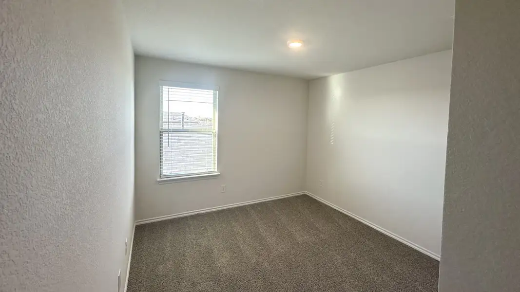 Representative unfurnished interior of a home built from the HANNA by D.R. Horton in Northspur, Forney (Image 20).