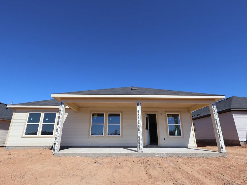 Exterior details and patio area of a home in Carillon, Manor (Image 2). Exterior details and patio area of a home in Carillon, Manor (Image 2).