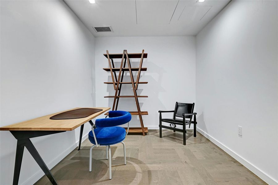 The den area provides a versatile space that can be used for various purposes, adding to the overall functionality of the home. Furnishings provided by Scott + Cooner available for purchase separately. Photo is model unit #2406.