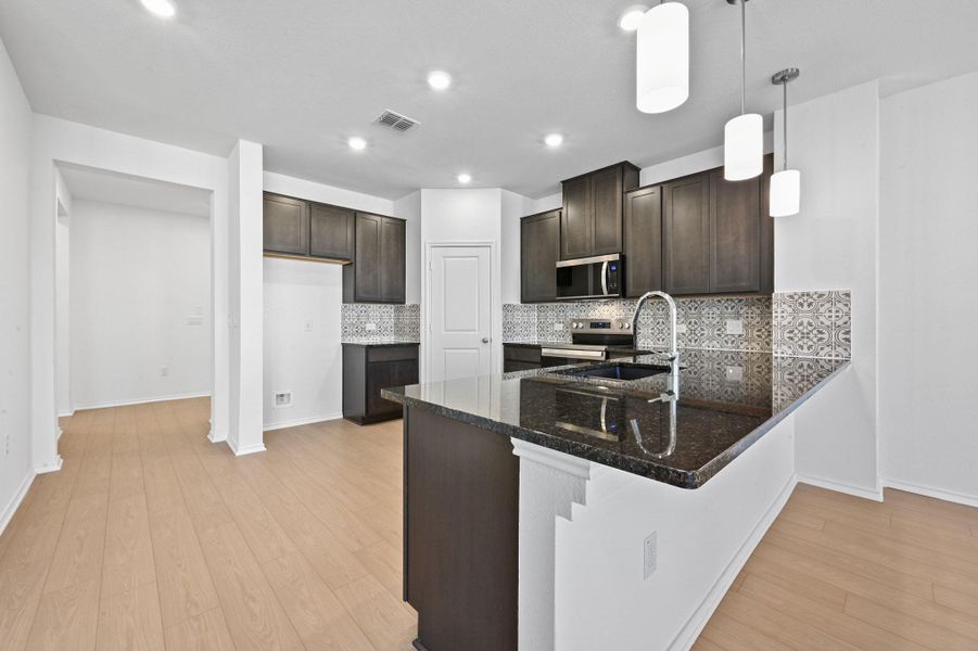 Furnished interior view inside a new home in Creekside at Estancia, Austin (Image 9).