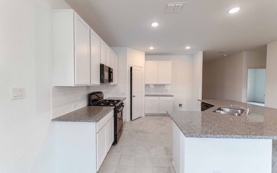 Furnished interior view inside a new home in Hunter's Ranch, San Antonio (Image 4).