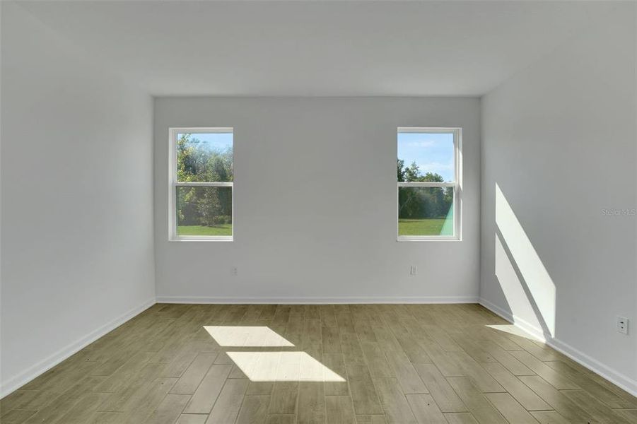 Spacious, unfurnished interior of a new home in Reserve at Hammock Oaks, Lady Lake (Image 30).