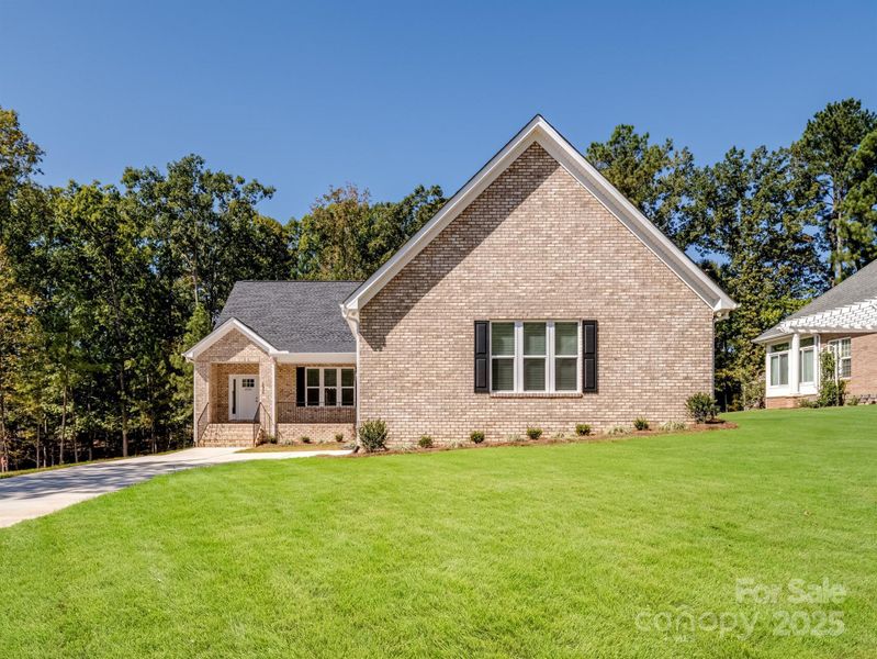 Front exterior of a new home in , Lancaster, SC, highlighting curb appeal (Image 2).