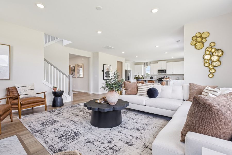 A living room with a couch and a coffee table.