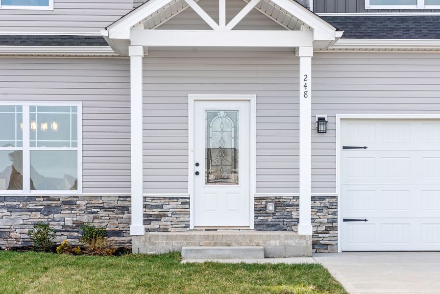 Representative exterior photo of a completed home built from the Bruno by Rockwood Homes in Cherry Fields, Clarksville, TN (Image 11). Representative exterior photo of a completed home built from the Bruno by Rockwood Homes in Cherry Fields, Clarksville, TN (Image 11).