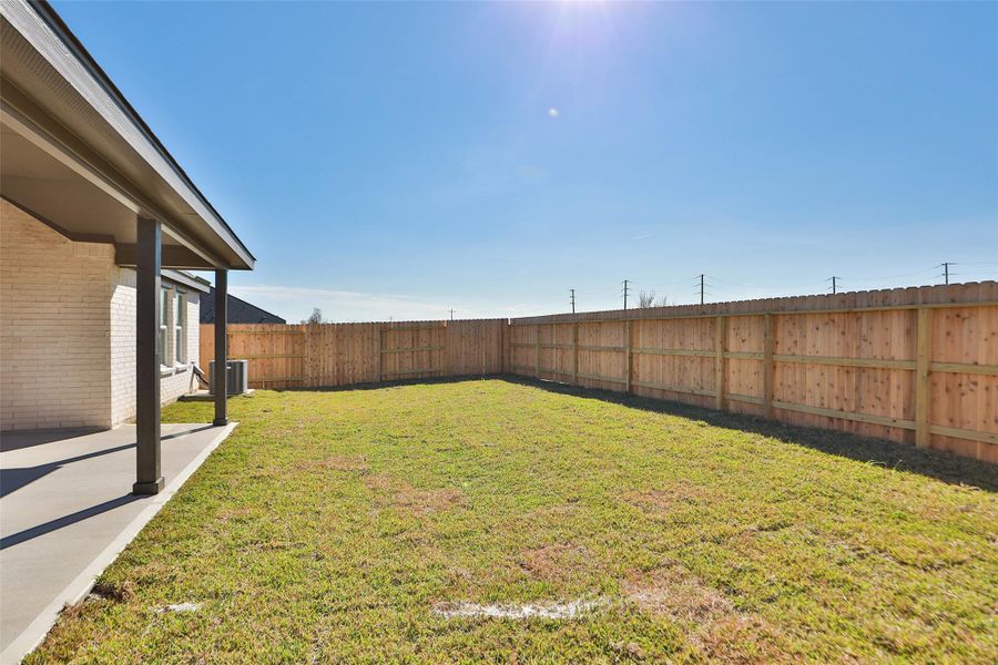 Exterior details and patio area of a home in River Ranch, Dayton (Image 18). Exterior details and patio area of a home in River Ranch, Dayton (Image 18).