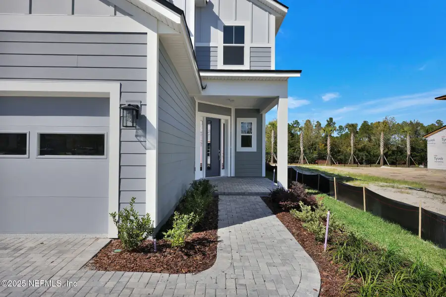 Exterior details and patio area of a home in Crosswinds at Nocatee, Nocatee (Image 4).