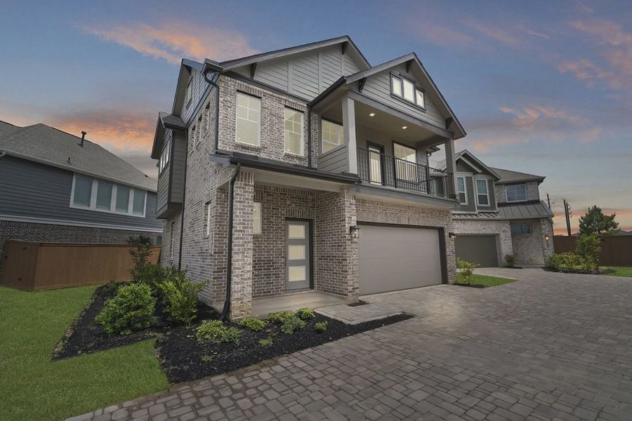 Front exterior of a new home in Elyson Courtyard Collection, Katy, TX, highlighting curb appeal (Image 16).