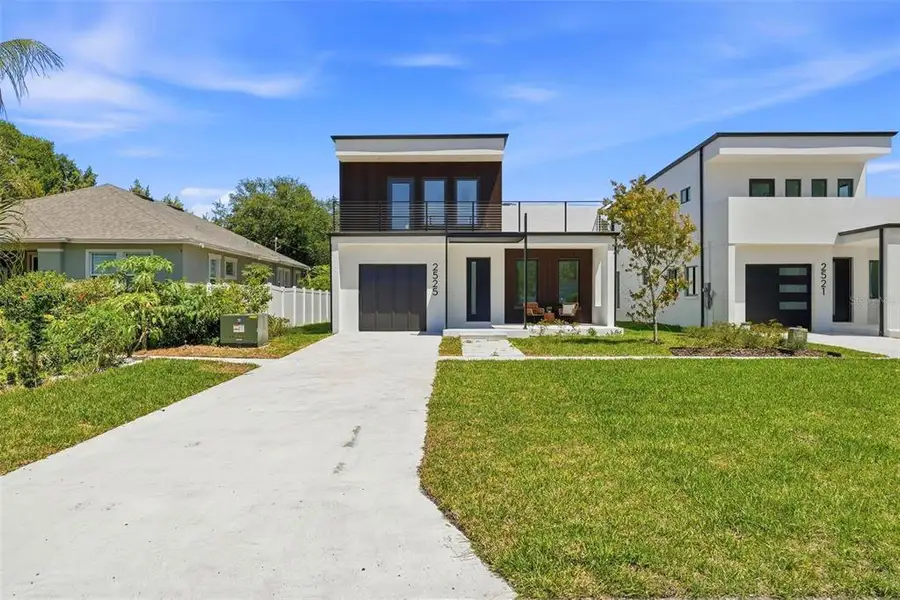 Front exterior of a new home in , St. Petersburg, FL, highlighting curb appeal (Image 25).