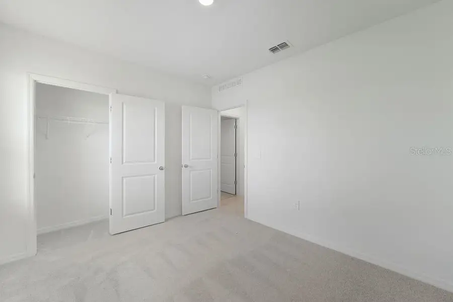 Spacious, unfurnished interior of a new home in Firethorn, Parrish (Image 30).