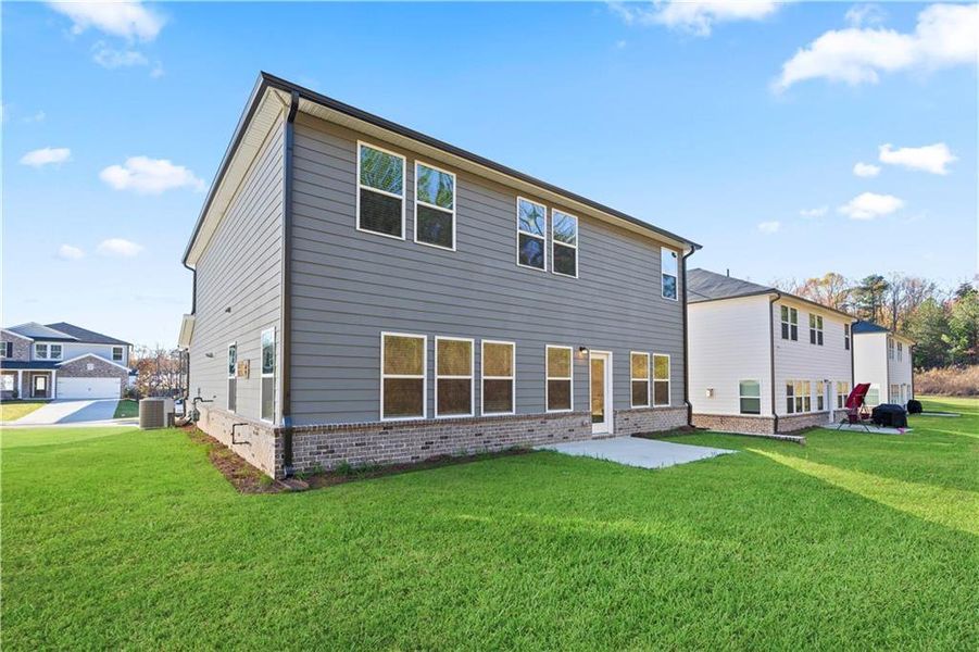 Exterior details and patio area of a home in Hamilton Crossing, Buford (Image 3).