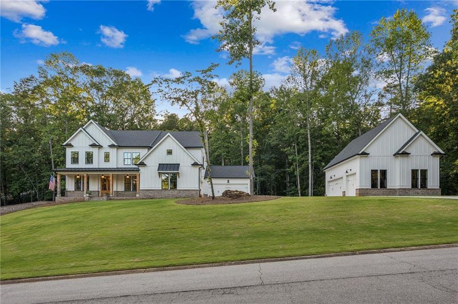 Front exterior of a new home in , Gainesville, GA, highlighting curb appeal (Image 38). Front exterior of a new home in , Gainesville, GA, highlighting curb appeal (Image 38).