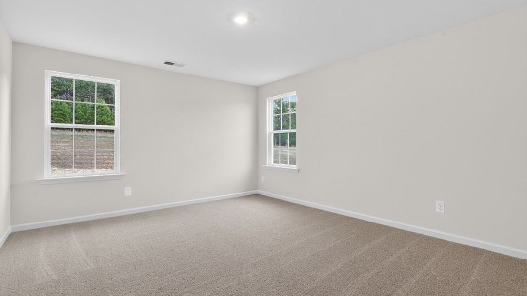 Spacious, unfurnished interior of a new home in Gretchen Pines, West End (Image 29).