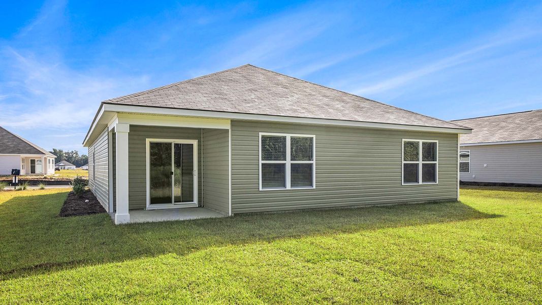 Exterior details and patio area of a home in Eden Springs, Longs (Image 3).
