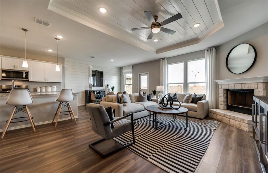 *Model Representation - Spacious gathering room with large windows