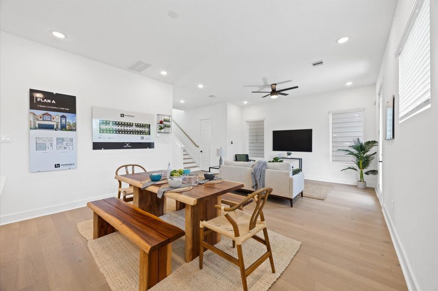 The open layout connects effortlessly to the kitchen, where a stylish island doubles as a dining space. High ceilings and strategically placed lighting enhance the airy feel, making the space ideal for both relaxation and entertaining. The open layout connects effortlessly to the kitchen, where a stylish island doubles as a dining space. High ceilings and strategically placed lighting enhance the airy feel, making the space ideal for both relaxation and entertaining.