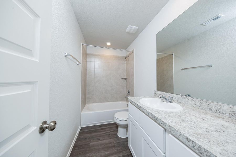 Furnished interior view inside a new home in Townsend Reserve, Splendora (Image 4).