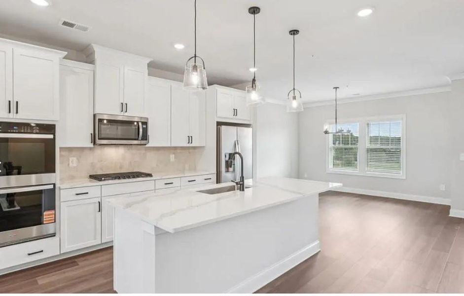 Furnished interior view inside a new home in , Cumming (Image 6). Furnished interior view inside a new home in , Cumming (Image 6).