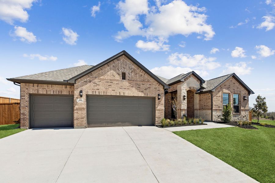 Front exterior of a new home in Lakeview Heights, Azle, TX, highlighting curb appeal (Image 2). Front exterior of a new home in Lakeview Heights, Azle, TX, highlighting curb appeal (Image 2).