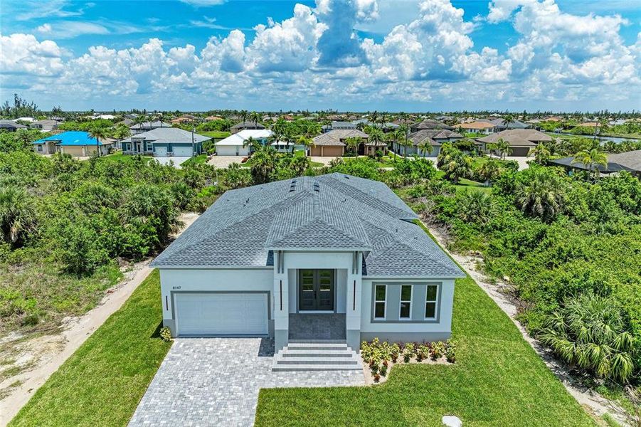 Front exterior of a new home in , Port Charlotte, FL, highlighting curb appeal (Image 27).
