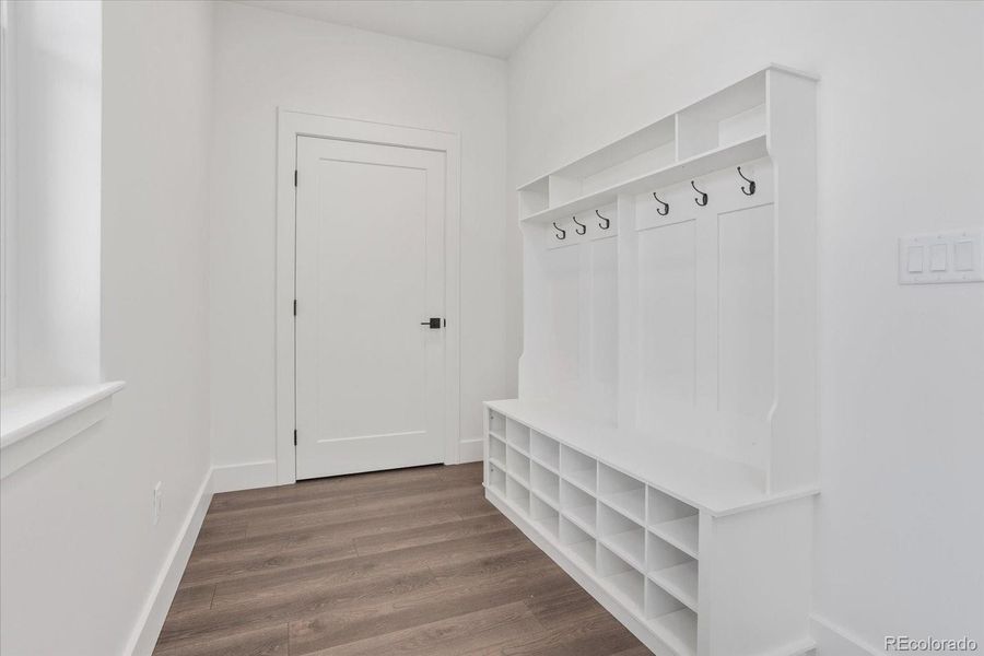 Convenient and well appointed built-in coat and shoe rack