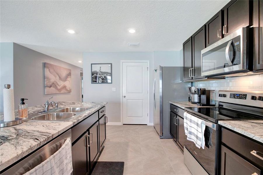 Furnished interior view inside a new home in River Park, Temple Terrace (Image 18).