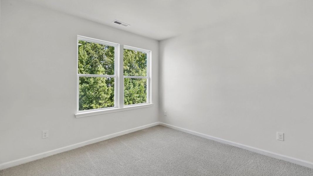 Spacious, unfurnished interior of a new home in The Gables at Edinborough Townes, Gibsonville (Image 19).