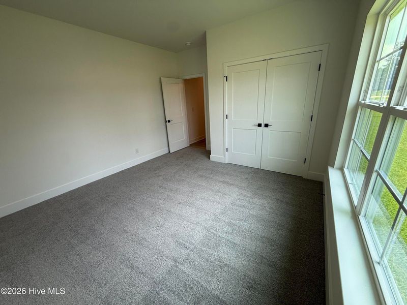 Spacious, unfurnished interior of a new home in Wood Creek Landing, Leland (Image 40). Spacious, unfurnished interior of a new home in Wood Creek Landing, Leland (Image 40).