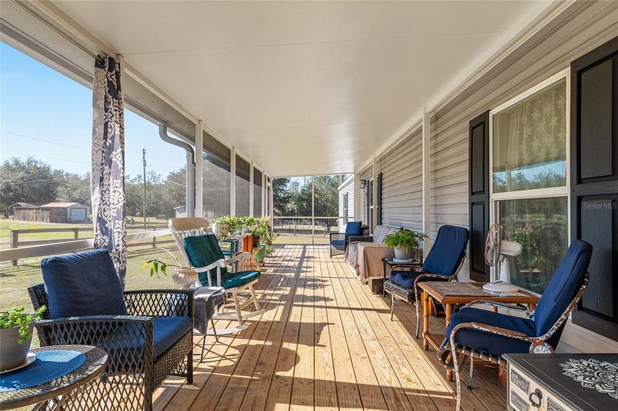 Exterior details and patio area of a home in , Weirsdale (Image 23).