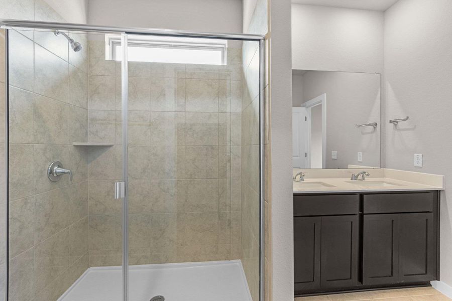Primary Bath retreat with dual vanities & walk-in shower Primary Bath retreat with dual vanities & walk-in shower
