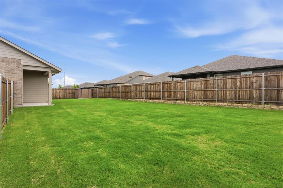 Exterior details and patio area of a home in , Denton (Image 22).