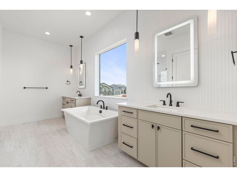 Furnished interior view inside a new home in RainDance, Windsor (Image 6).