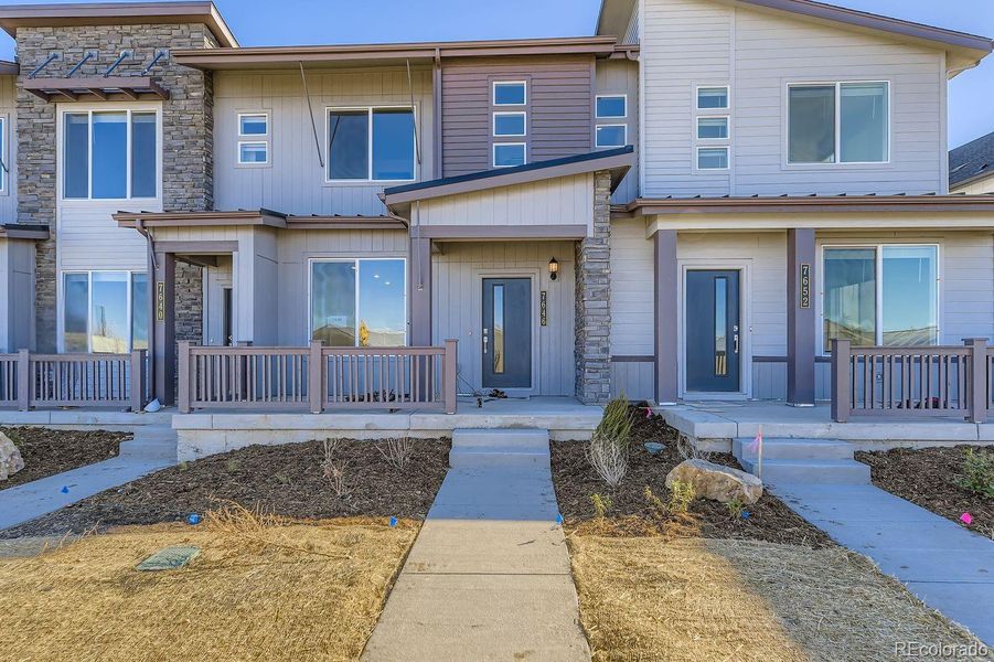 Front exterior of a new home in , Centennial, CO, highlighting curb appeal (Image 2).